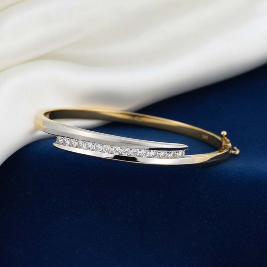14K Two-Tone Gold Ladies’ Bangle with 0.55ct of Round-Cut Diamonds