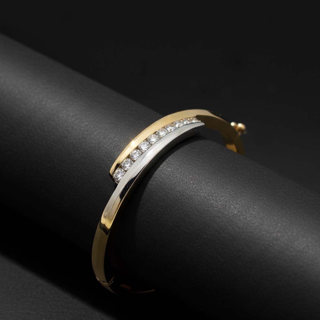 Ladies’ 14K Gold Two-Tone Bangle with 0.85ct of Round Diamonds