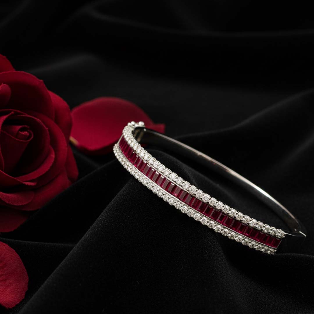 14K White Gold Channel-Set Ruby and Diamond Bangle Featuring 3.42 Carats of Rubies and 1.98 Carats of Diamonds