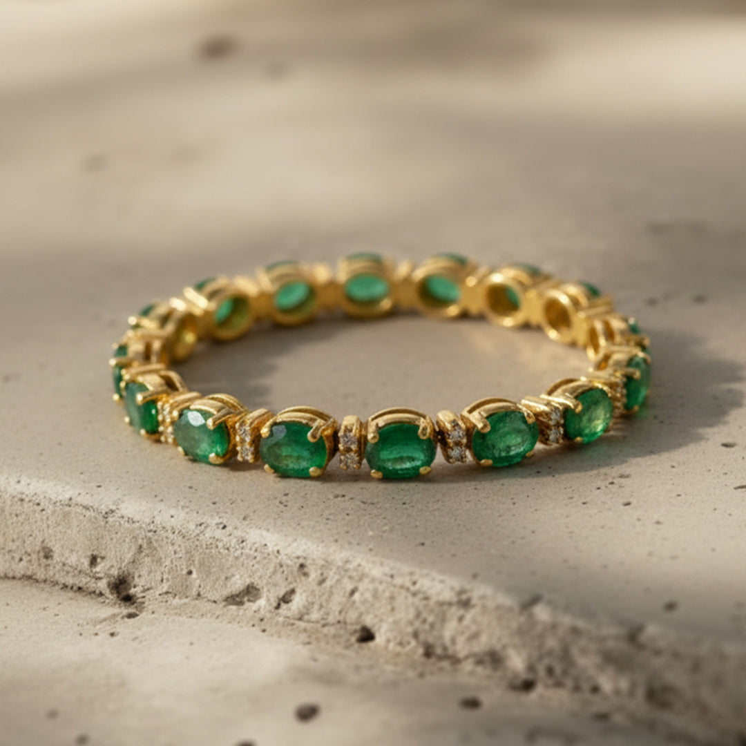 14KT Yellow Gold Emerald and Diamond Link Tennis Bracelet (EM 6.00 cts / DIA 0.75 cts)