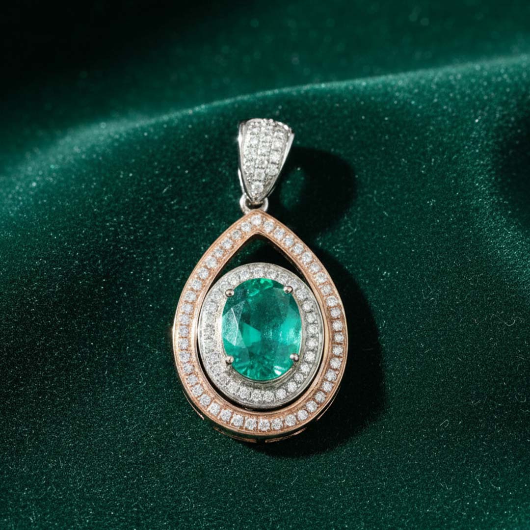 14KT Two-Tone Gold Oval Emerald (1.07ct) and Diamond (0.52ct) Pendant