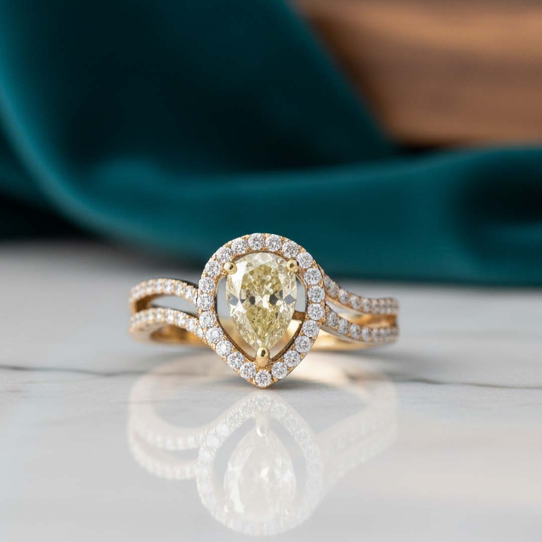 18KT Gold Pear-Shaped Yellow Diamond Halo Ring with 1.05ct Center and 0.82ct White Diamonds