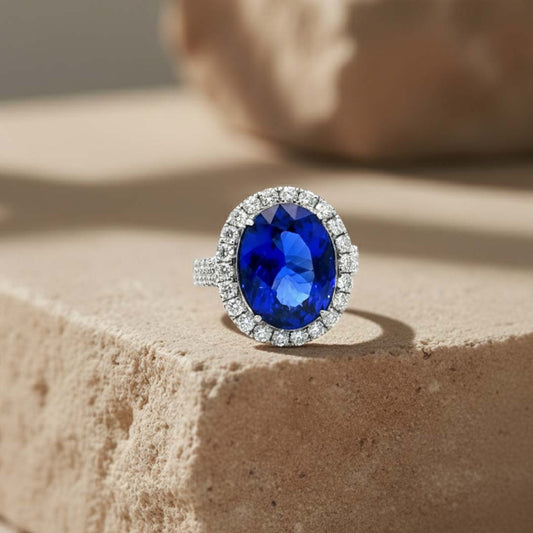 18K White Gold Natural Tanzanite & Diamond Ring – 7.50ct Oval Tanzanite with 1.12ct Diamond Halo