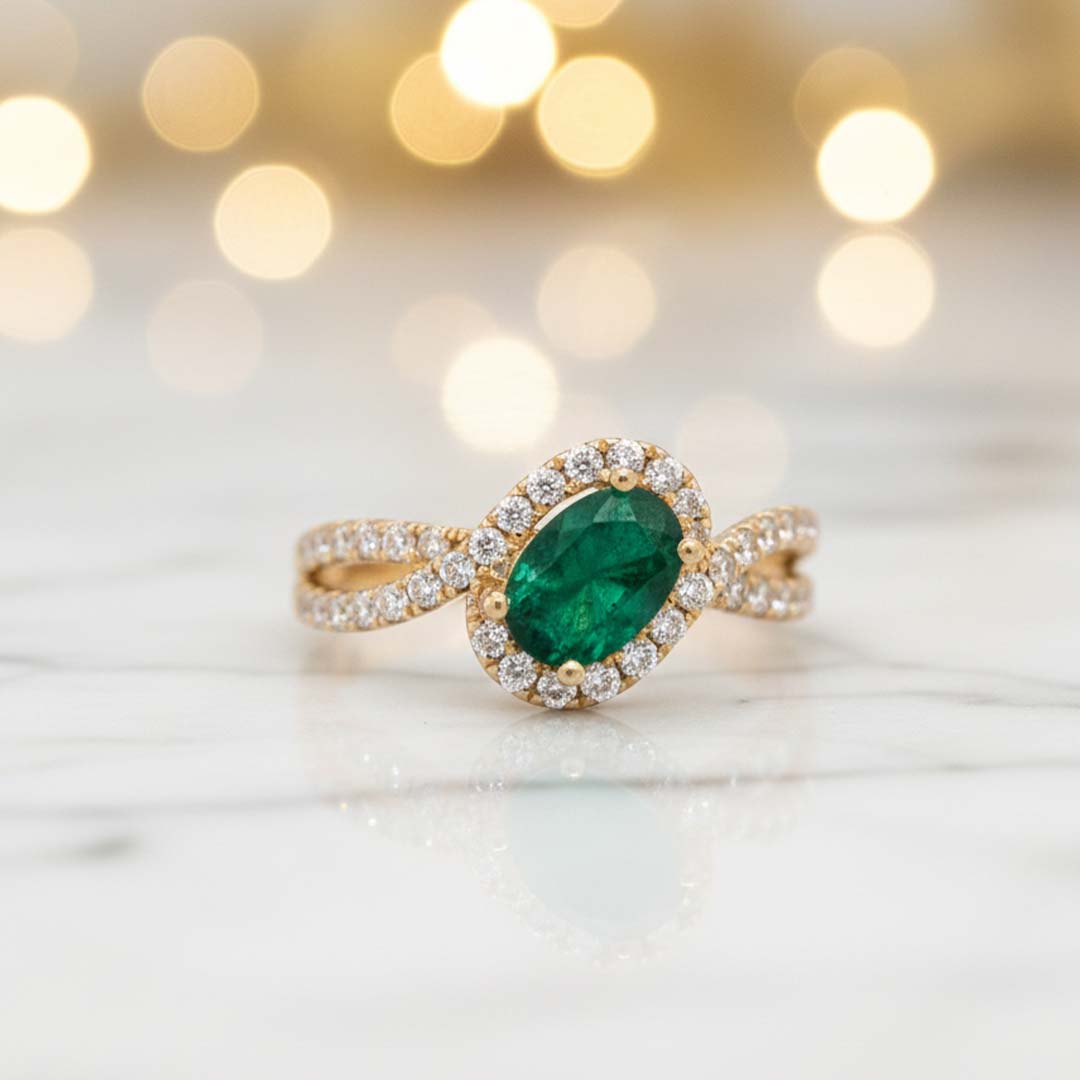 14KT Yellow Gold Oval Cut Emerald (0.76 CT) and Diamond (0.55 CT) Ring