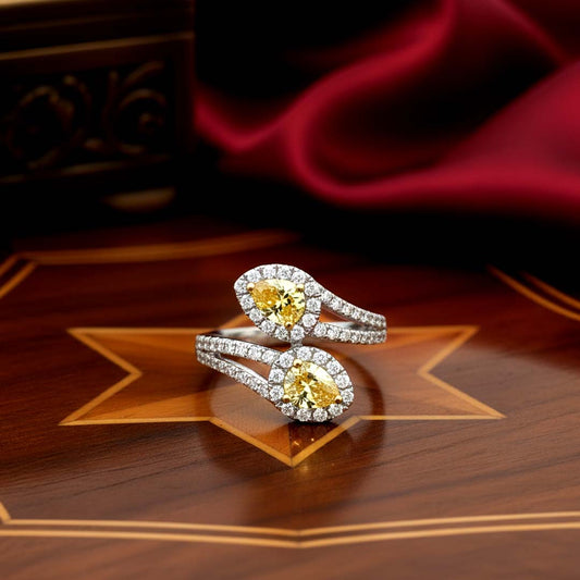 18KT Gold Dual Halo Ring with 0.89ct Fancy Yellow Diamonds and 0.59cts White Diamonds