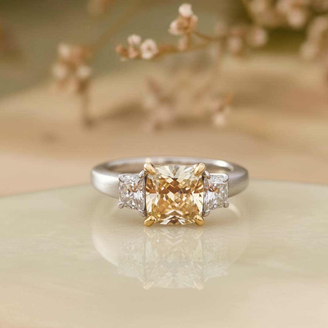 2.23ct Fancy Yellow Radiant-Cut Diamond Ring in Platinum with Trapezoid Side Diamonds