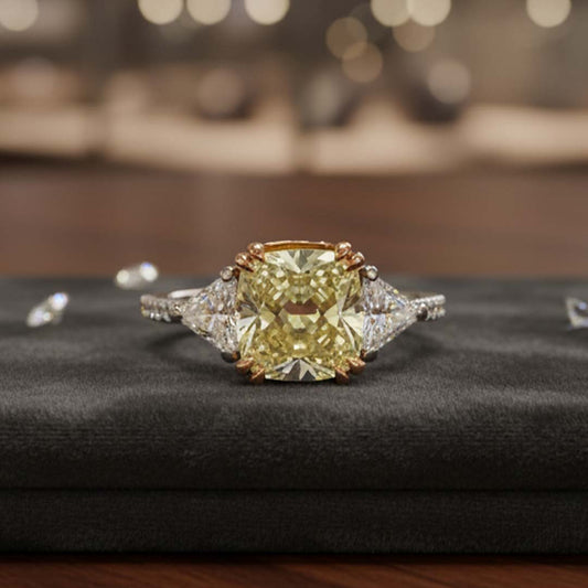 2.08ct Fancy Yellow Cushion-Cut Diamond Ring in 18K Gold with Trillion Side Diamonds