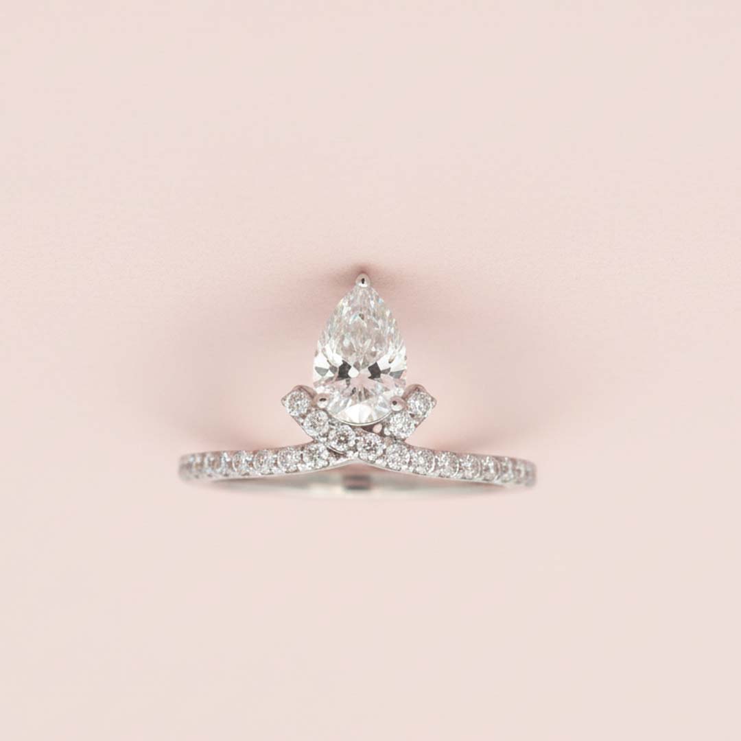 14K White Gold Ladies’ Ring Featuring 0.80ct Pear-Shaped Natural Diamond and 0.31ct Side Diamonds