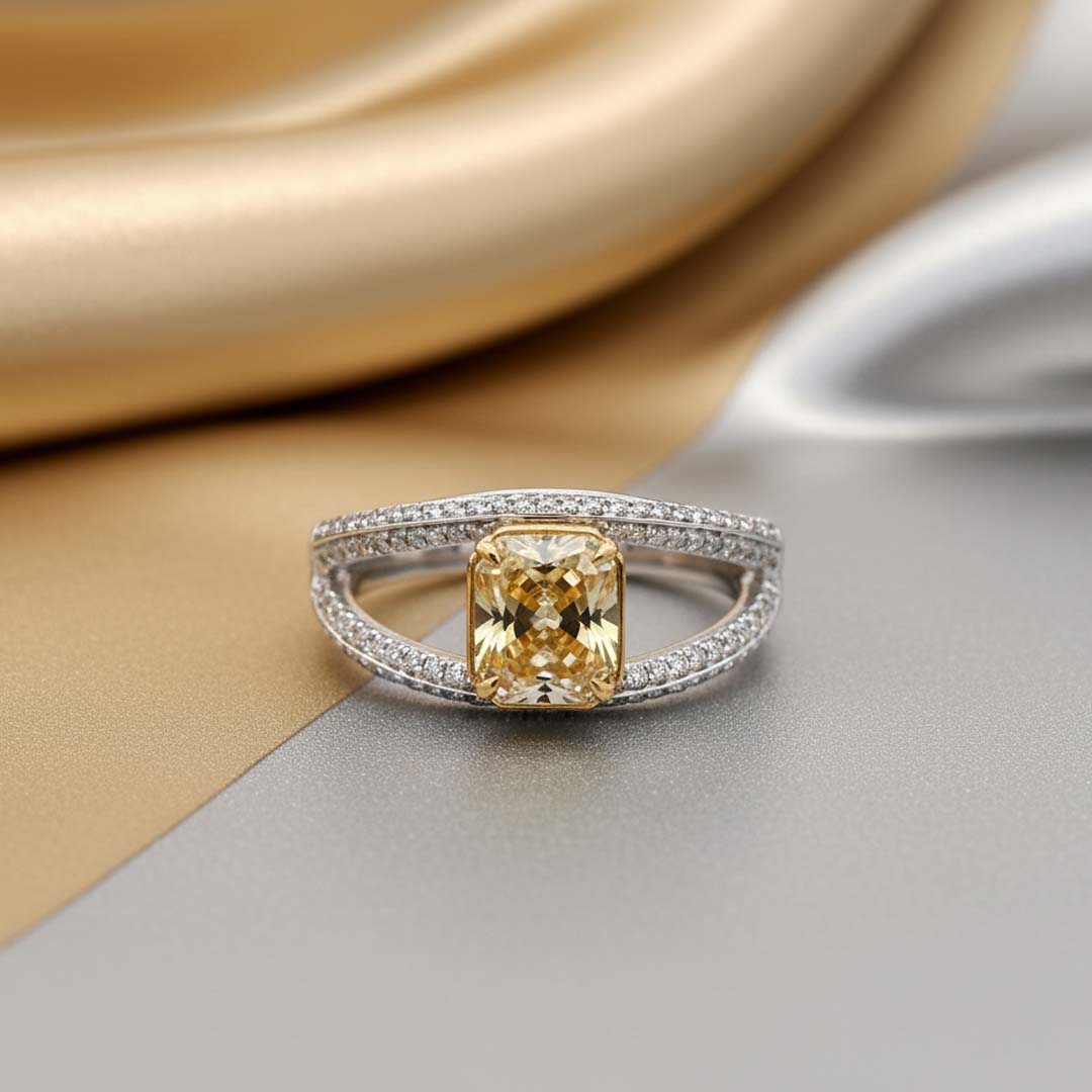 Elegant 18KT Gold Fancy Yellow Cushion Diamond Ring with White Diamond Accents – 2.48 Cts