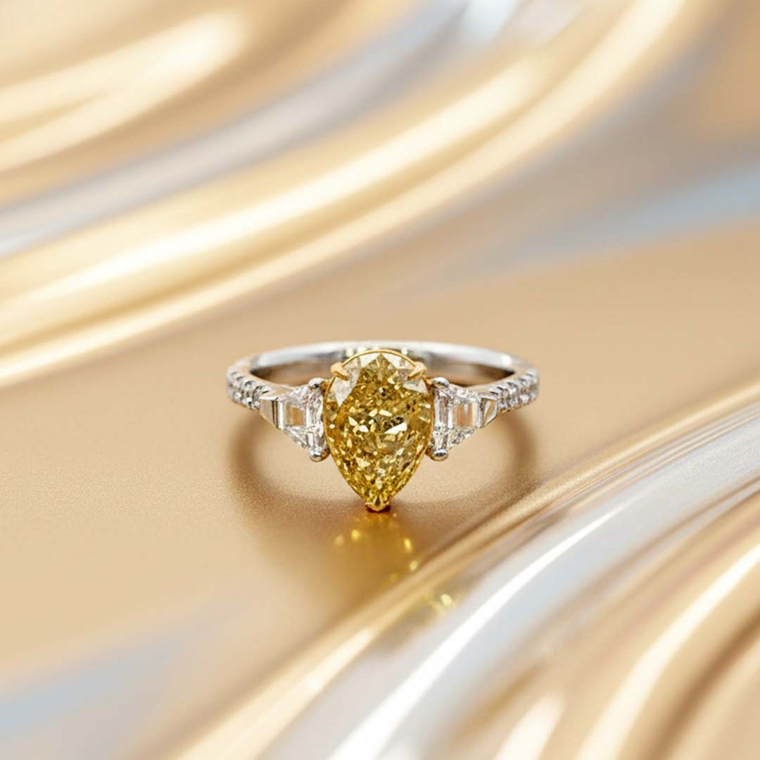 Elegant 18K Gold Fancy Yellow Diamond Ring with Baguette and Pavé Accents