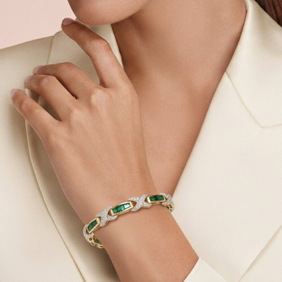 Exquisite 14KT Yellow Gold Emerald and Diamond “X” Motif Bracelet – A Harmony of Color and Brilliance