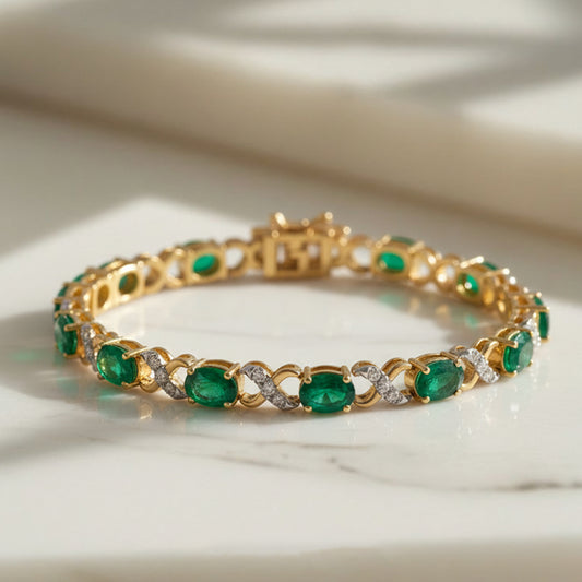 14KT Yellow Gold Emerald and Diamond Infinity-Link Bracelet (EM 6.30 cts / DIA 0.49 cts)