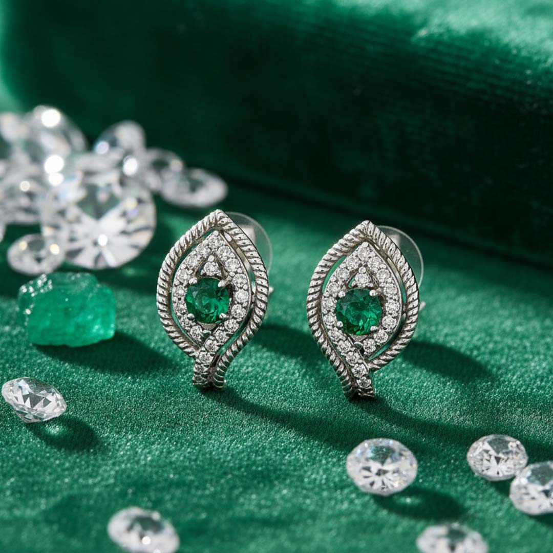 14KT White Gold Emerald (0.52CT) and Diamond (0.65CT) Leaf Design Earrings