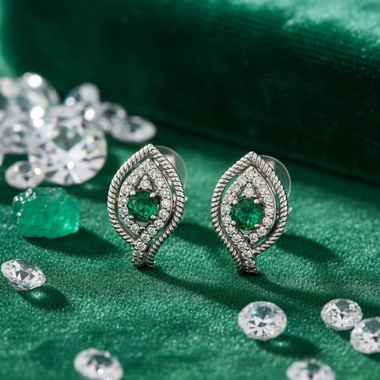 14KT White Gold Emerald (0.52CT) and Diamond (0.65CT) Leaf Design Earrings