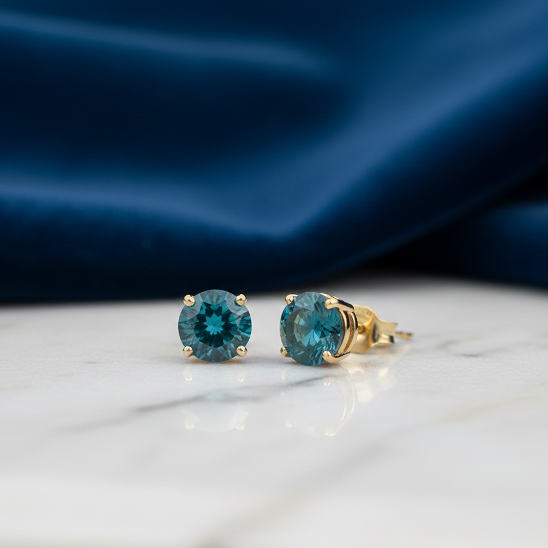 Classic Four-Prong Blue Diamond Solitaire Earrings in 14K Gold