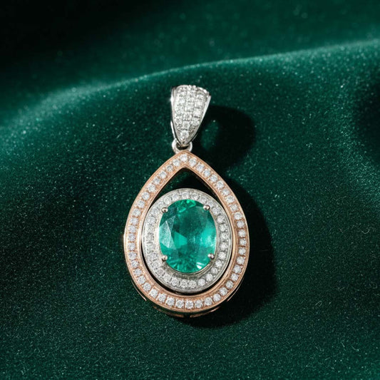 14KT Two-Tone Gold Oval Emerald (1.07ct) and Diamond (0.52ct) Pendant