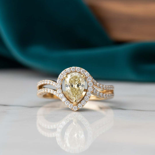 18KT Gold Pear-Shaped Yellow Diamond Halo Ring with 1.05ct Center and 0.82ct White Diamonds