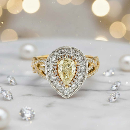18KT Gold Pear-Shaped Halo Ring with 0.72ct Fancy Yellow Diamond and 1.00ct White Diamonds
