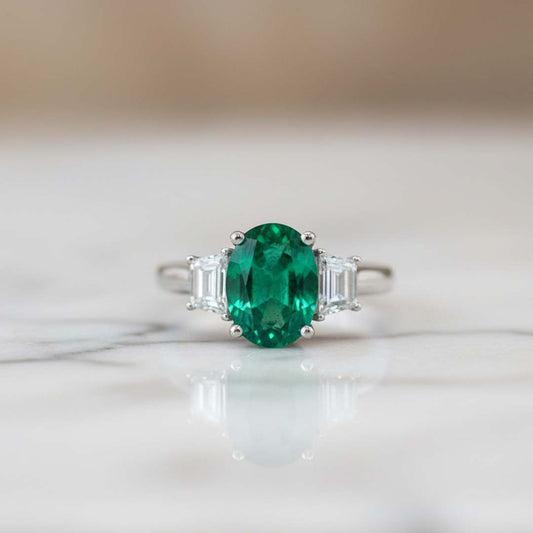 18KT White Gold Oval-Cut Emerald and Trapezoid Diamond Ring