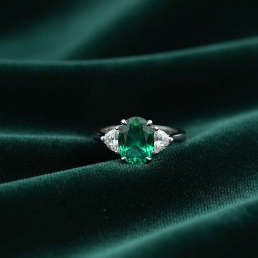 18K White Gold 3.25 CT Oval-Cut Emerald and 0.44 CT Trillion-Cut Diamond Ring