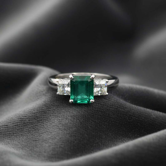 14K White Gold Ring with 2.44 ct Princess Cut Emerald and 1.00 ctw Princess Cut Diamonds