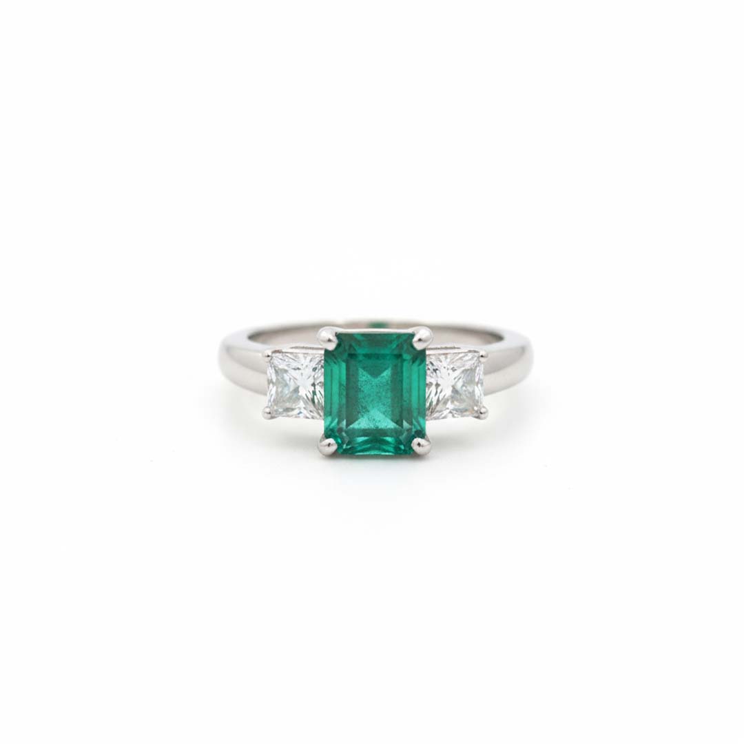 14K White Gold Ring with 2.44 ct Princess Cut Emerald and 1.00 ctw Princess Cut Diamonds