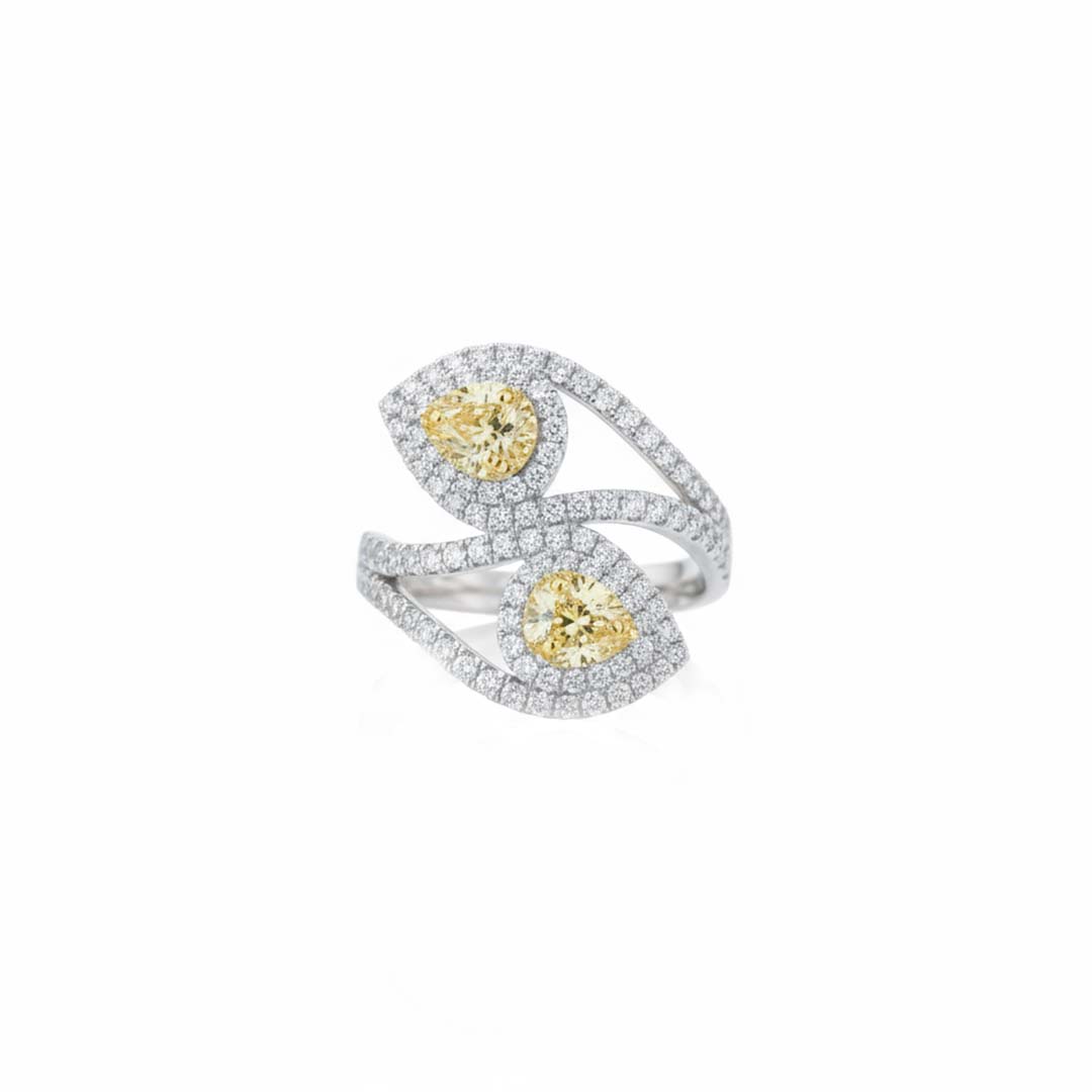 14KT Gold Bypass Ring with 0.75ct Fancy Yellow Pear Diamonds and 0.95cts White Diamonds