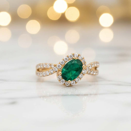 14KT Yellow Gold Oval Cut Emerald (0.76 CT) and Diamond (0.55 CT) Ring