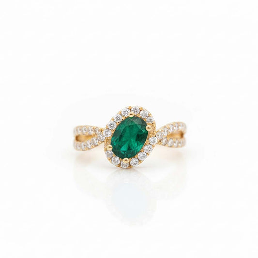 14KT Yellow Gold Oval Cut Emerald (0.76 CT) and Diamond (0.55 CT) Ring