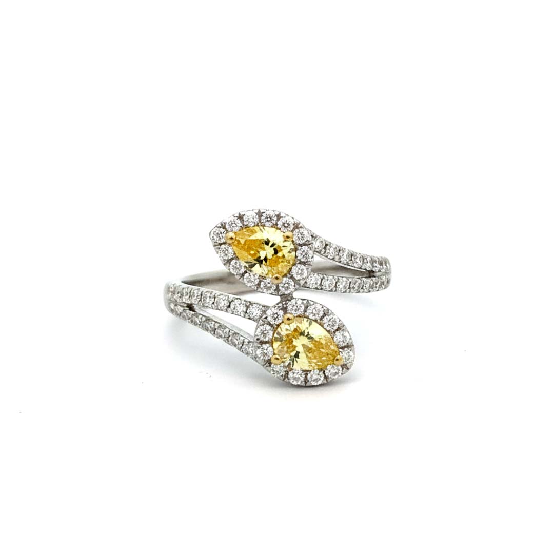 18KT Gold Dual Halo Ring with 0.89ct Fancy Yellow Diamonds and 0.59cts White Diamonds
