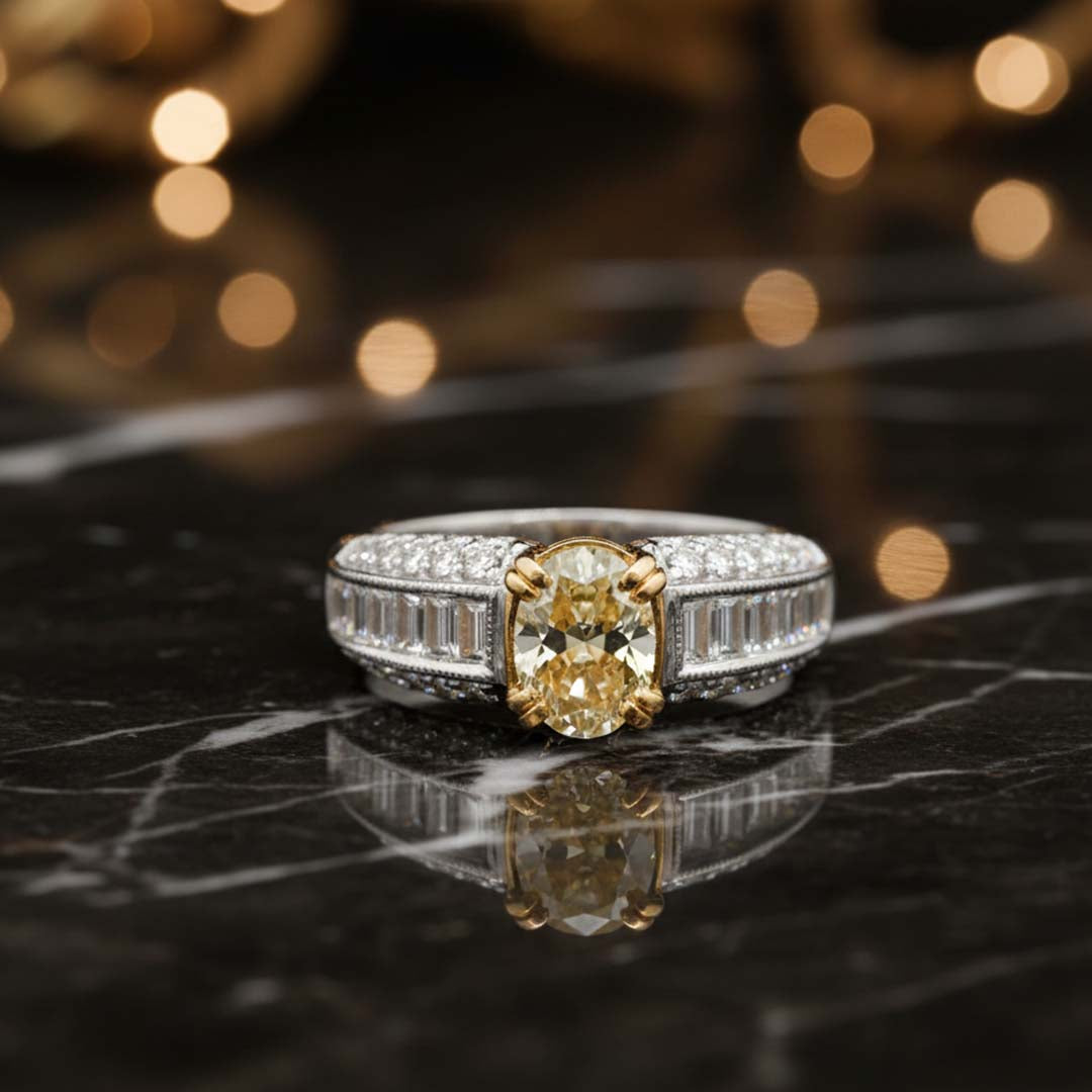 1.14ct Fancy Yellow Oval Diamond Ring in 18K Gold with Baguette & Pavé Diamonds