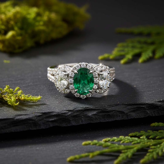 18K White Gold Oval Emerald and Diamond Three-Stone Halo Ring (2.57 CTW)