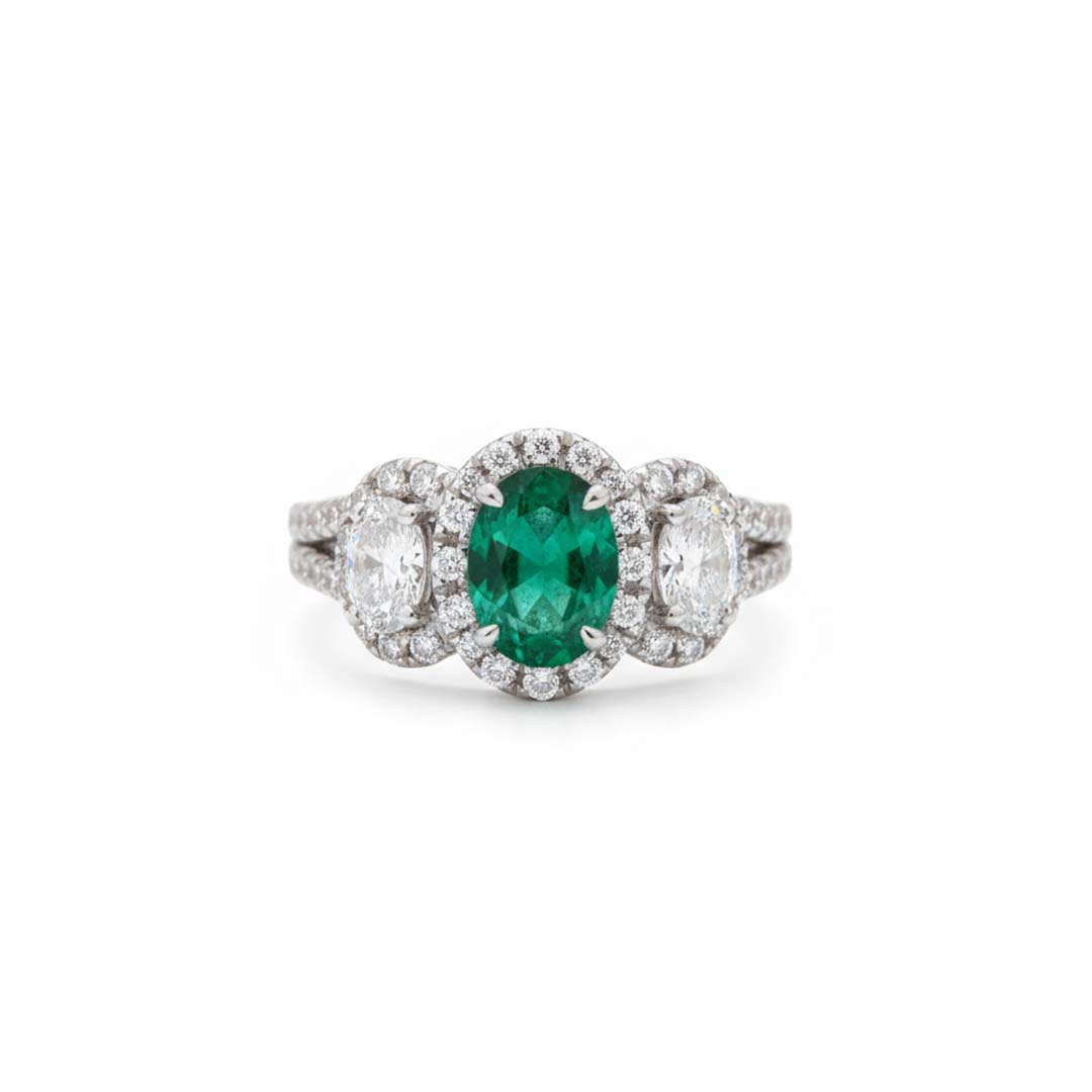 18K White Gold Oval Emerald and Diamond Three-Stone Halo Ring (2.57 CTW)