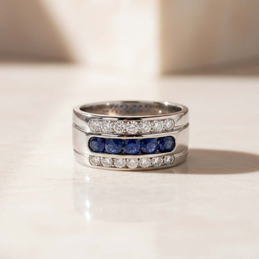 14KT White Gold Men’s Ring Featuring 1.00ct Deep Blue Sapphires and 0.70ct Diamond Rows