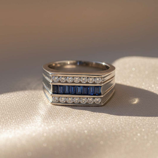 14KT White Gold Ring with 0.75ct Sapphires Nestled Between 0.50ct Sparkling Diamonds