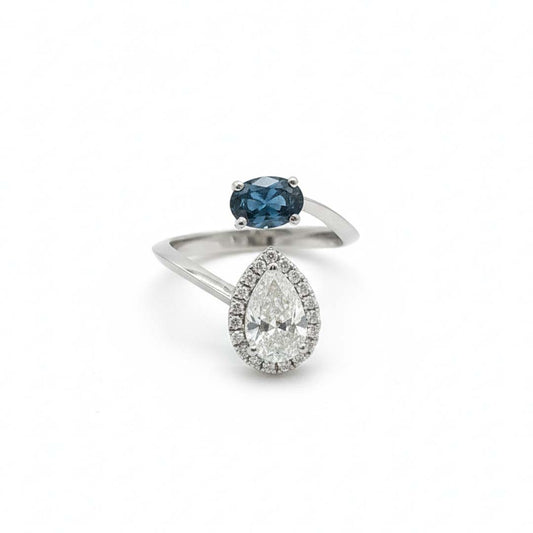 14K White Gold Ladies’ Ring Featuring 0.65ct Natural Blue Diamond and 1.17ct Pear-Cut White Diamond with Halo Accents