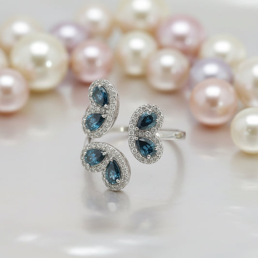 14K White Gold Ladies’ Ring with 1.16ct Natural Blue Diamonds and 0.55ct White Diamonds in a Pear-Cluster Halo Setting