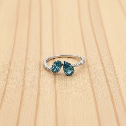 14K White Gold Ladies’ Ring Featuring 1.10ct Natural Blue Diamonds and 0.17ct White Diamonds with Pear-Cut Center Stones