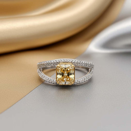 Elegant 18KT Gold Fancy Yellow Cushion Diamond Ring with White Diamond Accents – 2.48 Cts