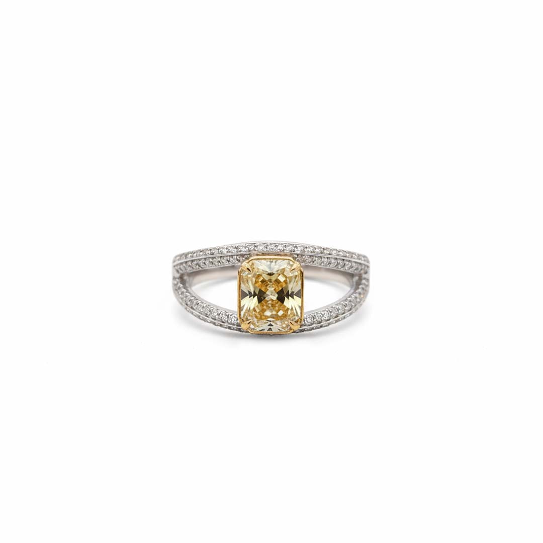 Elegant 18KT Gold Fancy Yellow Cushion Diamond Ring with White Diamond Accents – 2.48 Cts
