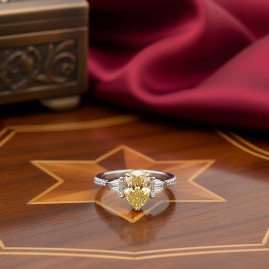 Elegant 18K Gold Fancy Yellow Diamond Ring with Baguette and Pavé Accents